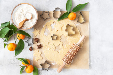 Cooking christmas cookies on gray background	
