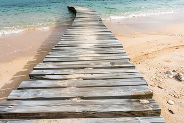 A long wooden pier stretches out into the ocean at sunset, with warm tones and gentle waves