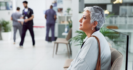 Thinking, waiting and senior woman in hospital, medical and calm with healthcare. Thoughts, mature...