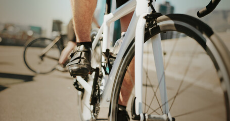 Obraz premium Fitness, man legs and bicycle in city for travel, exercise or cycling tour marathon. Athlete, bike or wheels on road for journey, endurance or eco friendly transport in Italy with commitment to sport