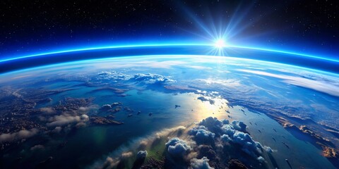 Obraz premium Earthrise A Breathtaking View of Our Planet from Space with a Glowing Sun Rising Above the Horizon and Clouds Covering the Surface