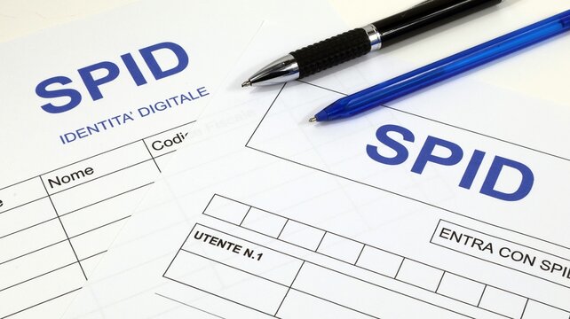 Documento Presentazione SPID Italiano La mano dell'uomo indica gli argomenti del Sistema Pubblico di Identit&agrave; Digitale.
