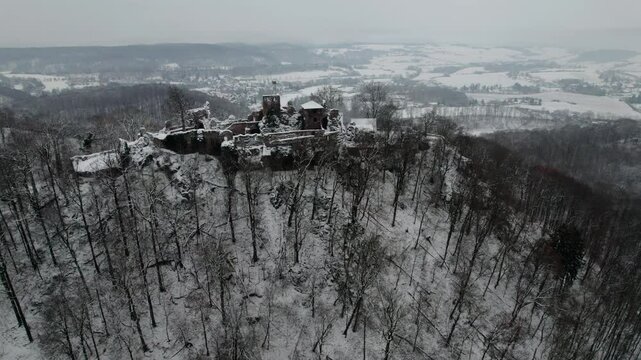 Aerial view ruins of old castle. Winter. Ruin of Hohnstein Castle, Harz mountains, Germany.