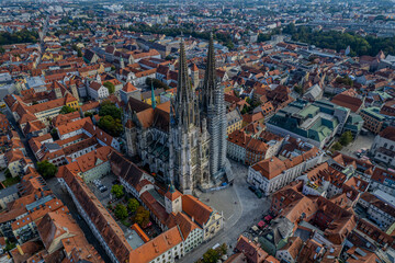 Beautiful aerial view of Regenesburg, its massive gothic St Peter cathedral, the Danube river and the Old Stone Bridge