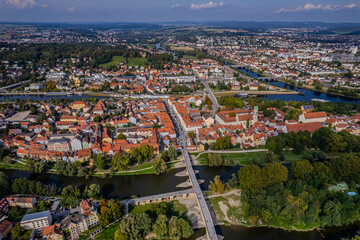 Obraz premium Beautiful aerial view of Regenesburg, its massive gothic St Peter cathedral, the Danube river and the Old Stone Bridge