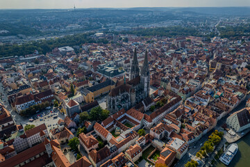 Obraz premium Beautiful aerial view of Regenesburg, its massive gothic St Peter cathedral, the Danube river and the Old Stone Bridge