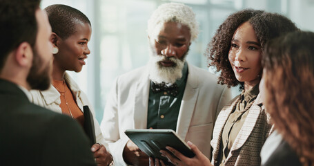 Fototapeta premium Business, man and leader with tablet in meeting for report, feedback or reviews on property development. Employees, diversity and people at office for teamwork or collaboration on real estate project