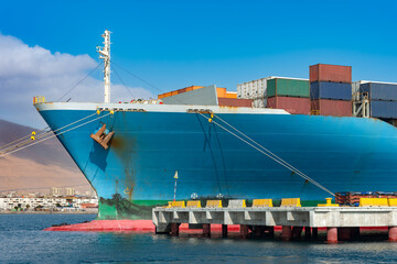 The bow of a cargo ship anchored at the port of Iquique in Chile.