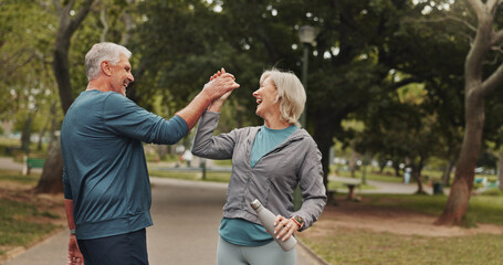 High five, senior couple and park for fitness goals, happy for wellness win with workout and bottle...