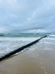 Cloudy seascape, seashore waves, natural sea horizon, cloudy sky