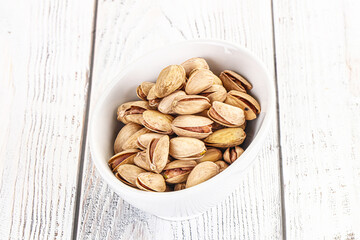 Salted tasty pistachio nuts heap