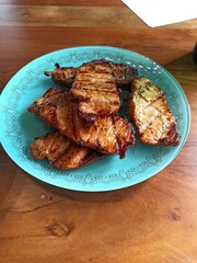Juicy pieces of meat cooked on coals on the grill. Summer picnics