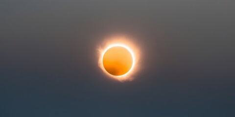 stunning view of solar eclipse sun's ring of fire shining brightly.