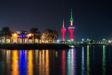 Skyline of Kuwait City with seaside at night in Kuwait