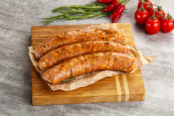 Raw sausages with spices and herbs