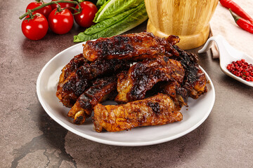 Grilled pork ribs in barbecue sauce