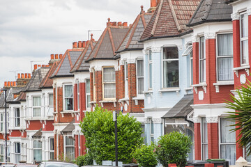 Row of traditional English terraced houses in Harringay, London, UK