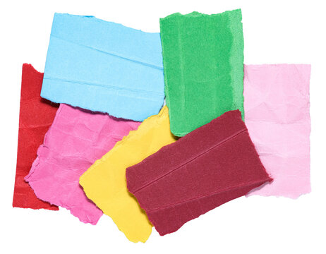 Stack of colorful crumpled wrinkled crushed pieces scraps, stripes or snippets of torn paper, isolated png transparent background design element