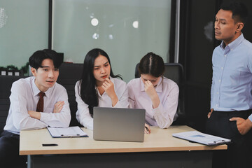 Frustrated upset multiracial business team people sad with bad work result in report disappointed in corporate bankruptcy failure crisis worried of paperwork problem sit at table at office meeting