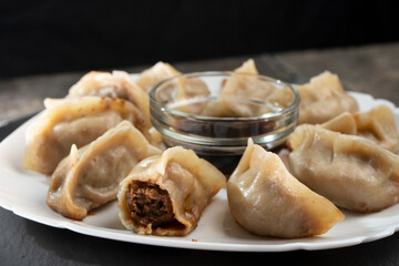 Chinese dumplings are a traditional dish for Chinese New Year. Food concept. Chinese food. dumplings with meat