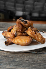 Fried eggplants with meat on a wooden background. Food concept. Chinese food.