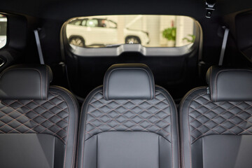 Car back seat with headrest and arm rest, a comfortable automotive fixture