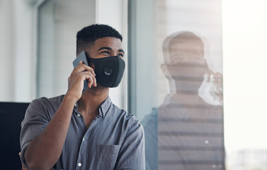 Man, phone call and office for plan with face mask, journalist and talk to contact for quote. Male...