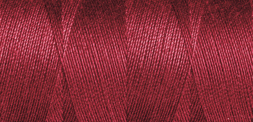 Red sewing thread texture