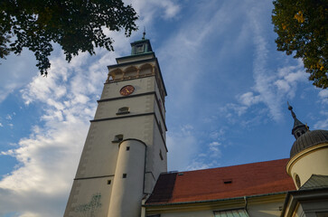 Cathedral of the Nativity of the Blessed Virgin Mary in Żywiec – a temple built in the fifteenth century with a high tower with a clock on it © Pawel Filusz