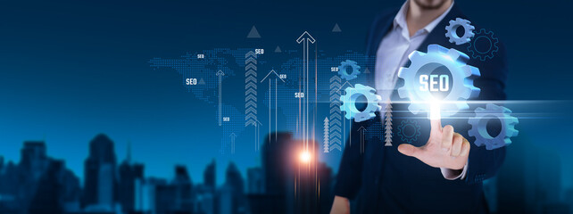 SEO: Keyword optimization, search rankings, content strategy, link building, analytics, traffic generation, conversion optimization. Businessman hand hold SEO and network on digital interface.