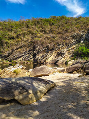 Obraz premium Nice region with river, calm water, good pools, clean beaches, all of them inside a mountain ridge called Serra do Cipo in Minas Gerais, Brazil.
