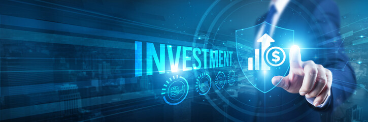 Investment. Businessman hand touches a shield, Investment protection strategy management. The concept represents safeguarding financial assets, long-term growth, security, diversifying asset holdings.