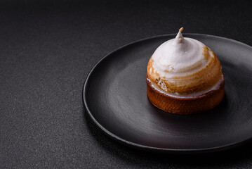 Sweet lemon tart with cream filling and zest