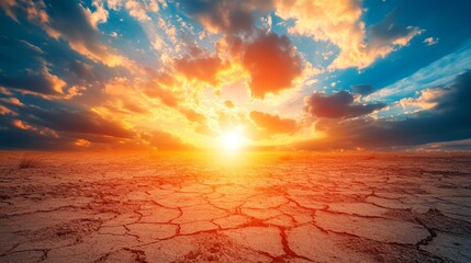 Vibrant Sunset Over A Cracked Desert Landscape