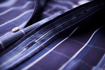 Close up of Men's checkered shirt.	