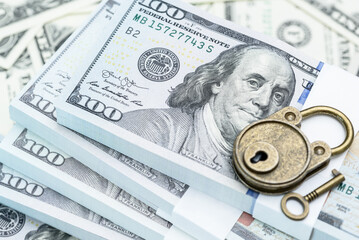 Financial security, wealth protection, confidentiality, and safeguarding investment : Stacks of US...