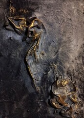 Contemporary high texture abstract painting in natural gold dark brown background composition