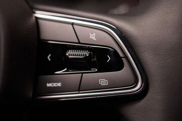 The modern cars steering wheel control panel boosts convenience and performance