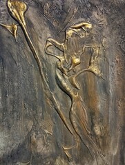 Contemporary high texture abstract painting in natural gold dark brown background composition