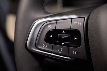 The modern cars steering wheel control panel boosts convenience and performance