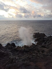 Souffleur,  natural blowhole with blows salt water with pressure like a geyser in the Indian Ocean, Saint Leu, Reunion iisland. 