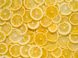 Close-up Top down full frame Flat Lay photograph of Fresh Citrus Lemon Slices © gchapel