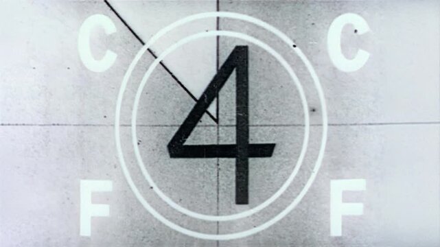 Vintage film countdown leader with number 8-2, aged textures, defocused film look, flicker, grain and scratches effect, classic reel markings for retro video overlays, 4K