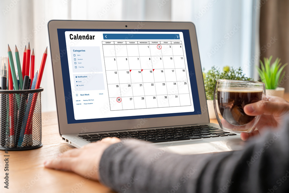 Poster calendar on computer software application for modish schedule planning for personal organizer and on