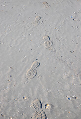 Footprints of a person on the sand