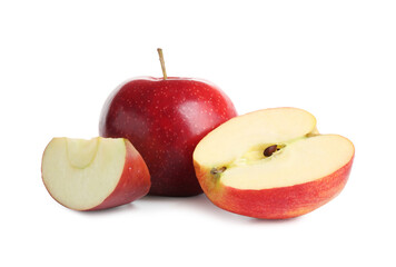 Whole and cut ripe red apples isolated on white