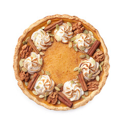 Homemade pumpkin pie with whipped cream, seeds and cinnamon isolated on white, top view