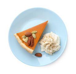 Piece of tasty homemade pumpkin pie with whipped cream, seeds and nuts isolated on white, top view