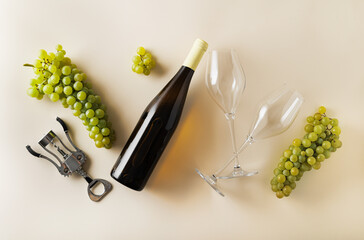 Refined and sophisticated composition with a bottle of wine, elegant glasses, a corkscrew and a...