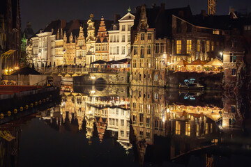 Fototapeta premium Korenlei dock night reflection in Ghent, Flemish Region, Belgium. Mirror picture. Water reflection.